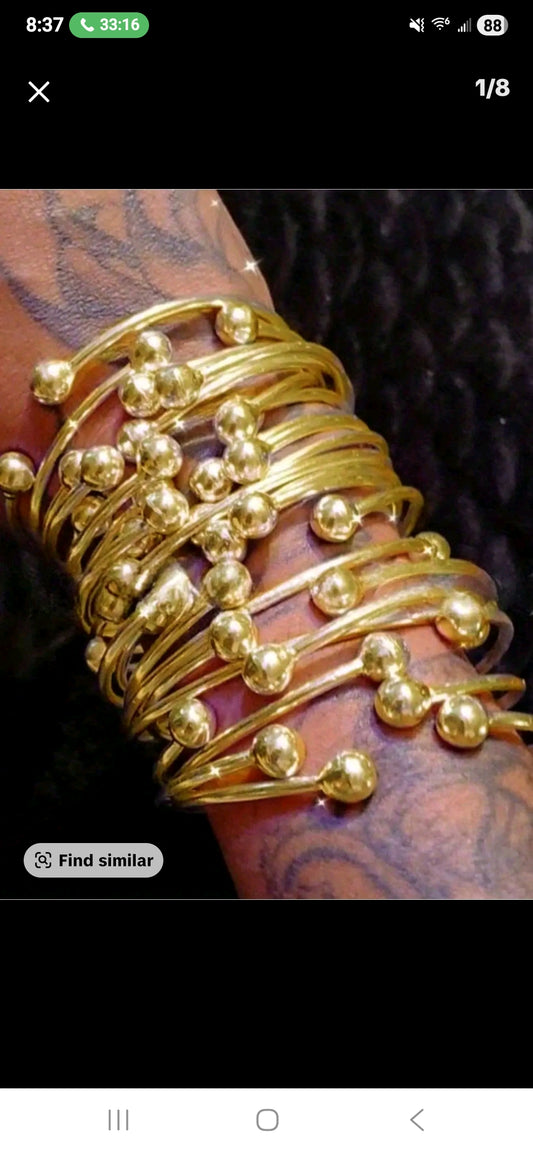 STATEMENT CUFF BANGLES